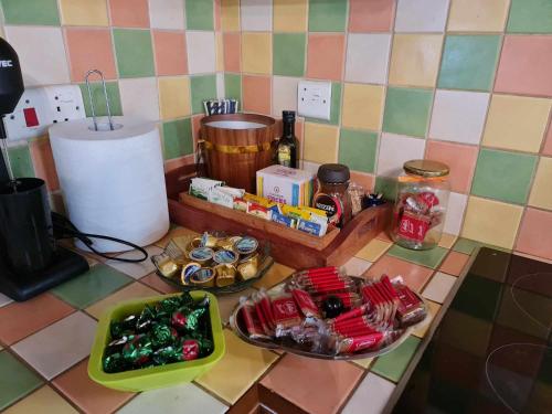 a kitchen counter with food on a counter top at House of Roses in Limassol