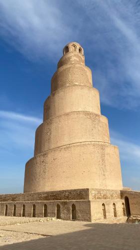 a large stone tower on top of a building at Dijlat Al Khair Hotel فندق دجلة الخير in Baghdad