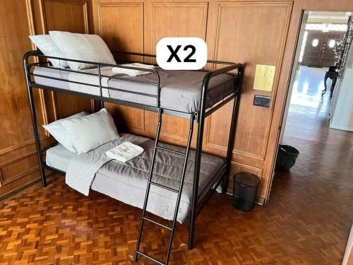 Letto o letti in una camera di Pill Hill Mansion