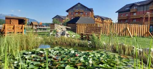 Κήπος έξω από το Tatragolf - Apartmán Milan K 204