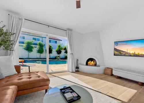 a living room with a couch and a fireplace at Lobster Trap Tempe home in Tempe