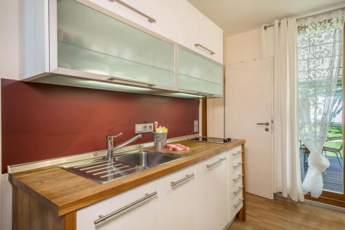 Η κουζίνα ή μικρή κουζίνα στο Ferienhaus Im Tobel