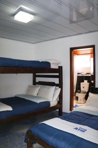 Ένα ή περισσότερα κρεβάτια σε δωμάτιο στο Hotel Costa Azul