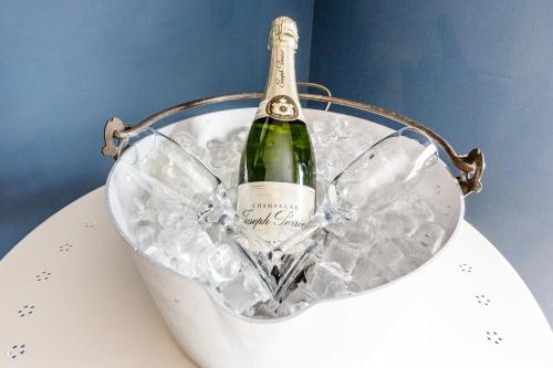a bottle of champagne in a bucket of ice at The Boat Inn in Aboyne