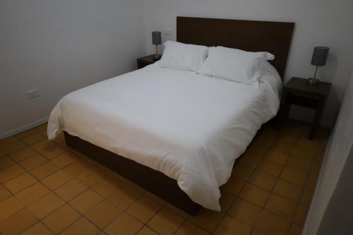Cama o camas de una habitación en Hotel Mado