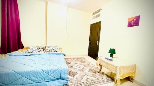 Tempat tidur dalam kamar di BAITH AL JANNAH