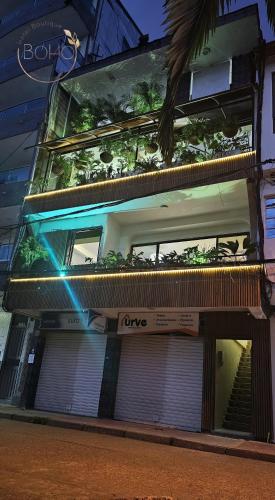 a building with a sign on the front of it at HOTEL BOHO BOUTIQUE in Quibdó