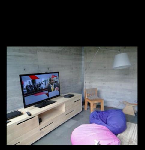 TV a/nebo společenská místnost v ubytování Casa Calafquen