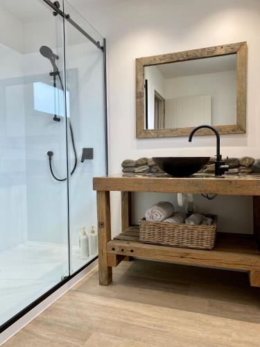 a bathroom with a sink and a mirror at Sefton View in Lake Tekapo