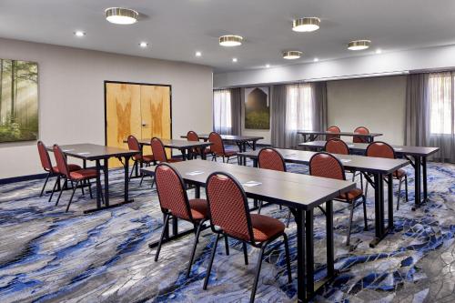 a classroom with tables and chairs in a room at Fairfield Inn & Suites by Marriott Gainesville in Gainesville