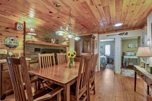 a dining room with a wooden table and chairs at Lakeview Retreat in Lakeville
