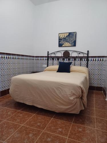 Ένα ή περισσότερα κρεβάτια σε δωμάτιο στο Casa Manuela. Algodonales (Cádiz)