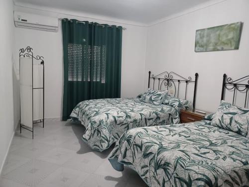 Ένα ή περισσότερα κρεβάτια σε δωμάτιο στο Casa Manuela. Algodonales (Cádiz)