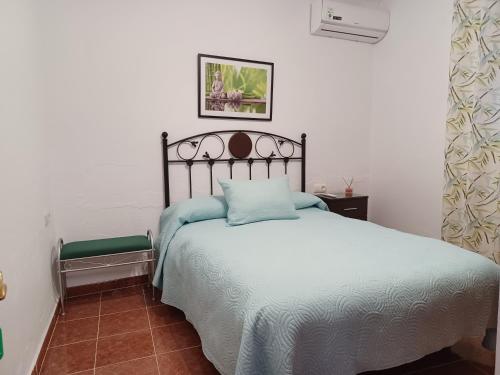Ένα ή περισσότερα κρεβάτια σε δωμάτιο στο Casa Manuela. Algodonales (Cádiz)