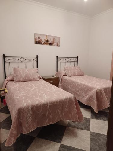 Ένα ή περισσότερα κρεβάτια σε δωμάτιο στο Casa Manuela. Algodonales (Cádiz)