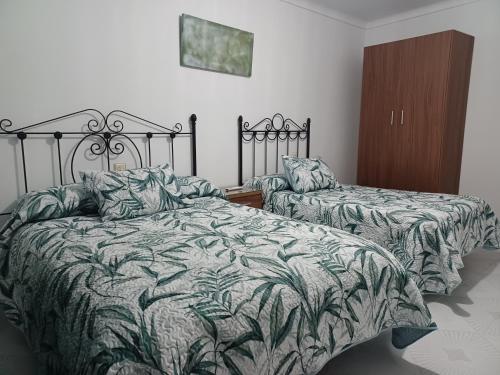 Ένα ή περισσότερα κρεβάτια σε δωμάτιο στο Casa Manuela. Algodonales (Cádiz)
