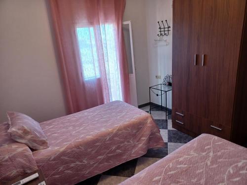 Ένα ή περισσότερα κρεβάτια σε δωμάτιο στο Casa Manuela. Algodonales (Cádiz)