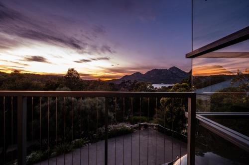 a sunset from the balcony of a house at The Bolthole in Coles Bay