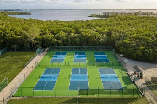 an overhead view of a tennis court with blue windows at Marriott Hutchinson Island Beach Resort, Golf & Marina in Stuart