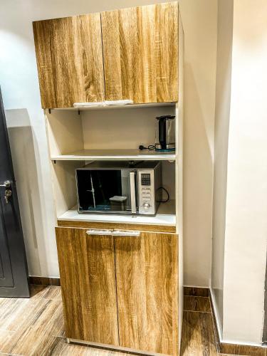 O bucătărie sau chicinetă la Chambre Deluxe