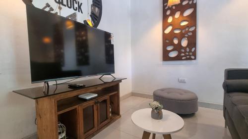 TV a/nebo společenská místnost v ubytování Quinta Confort