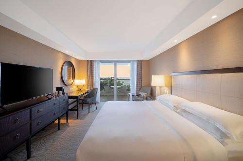 Postel nebo postele na pokoji v ubytování Sheraton Grand Rio Hotel & Resort