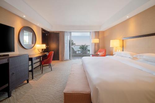 Postel nebo postele na pokoji v ubytování Sheraton Grand Rio Hotel & Resort