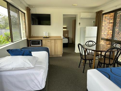 Kuchyň nebo kuchyňský kout v ubytování Logan City Motor Inn