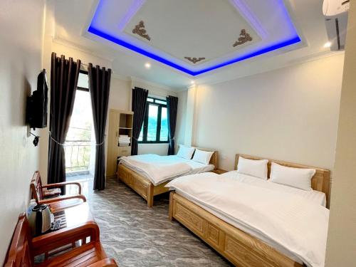 Postel nebo postele na pokoji v ubytování NHÀ NGHỈ ANH VĂN