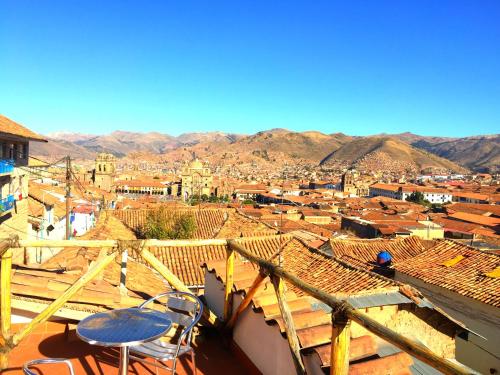 a view of a city from the roof of a building at Rumi Wasi in Cusco