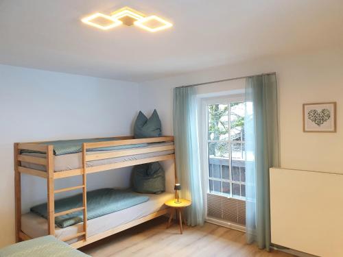 Ferienwohnungen Winkler emeletes ágyai egy szobában