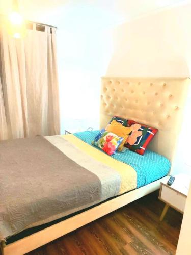 Кровать или кровати в номере APART BELLAS ARTES LASTARRIA