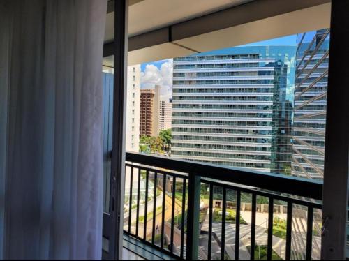 a balcony with a view of a large building at Hotel Vision in Brasilia