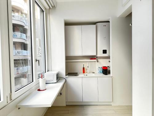 A kitchen or kitchenette at Apartment Belfiore