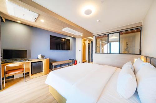 TV o dispositivi per l'intrattenimento presso Hound Hotel Ulsan