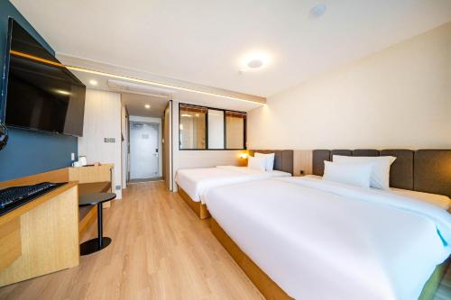 Letto o letti in una camera di Hound Hotel Ulsan
