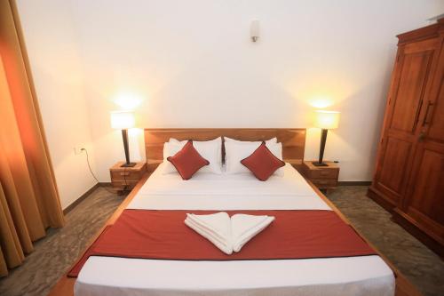 Ένα ή περισσότερα κρεβάτια σε δωμάτιο στο villa Breezehaven