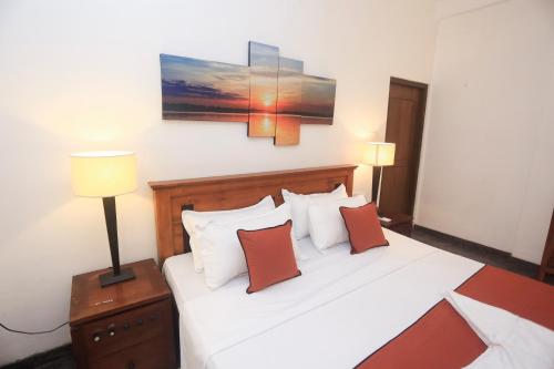 Ένα ή περισσότερα κρεβάτια σε δωμάτιο στο villa Breezehaven