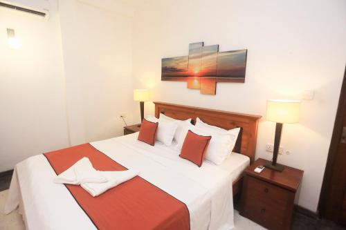 Ένα ή περισσότερα κρεβάτια σε δωμάτιο στο villa Breezehaven