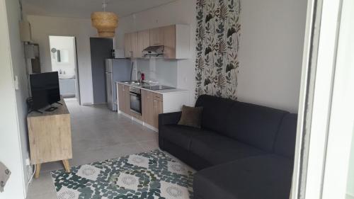 Una cocina o zona de cocina en RésidencesTYS