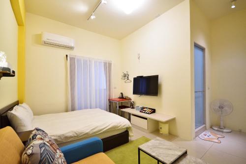 Μια τηλεόραση ή/και κέντρο ψυχαγωγίας στο 別有洞天電梯包棟民宿洞洞館