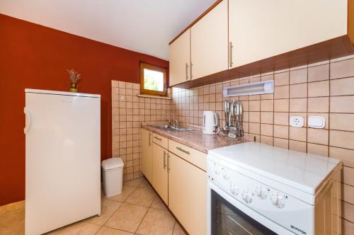 A cozinha ou cozinha compacta de Apartments Jagoda