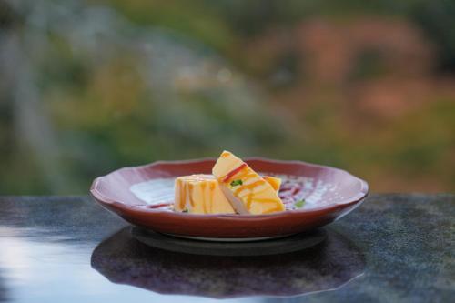 a plate of food sitting on a table at HOTEL LT Kitchen Yugawara in Yugawara