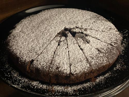 a chocolate cake on a plate on a table at Villa Santacroce in San Giovanni Rotondo