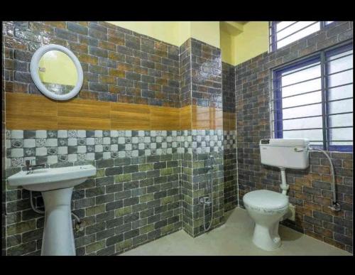 Ванна кімната в BHAVISHA LUXURY HOSTEL