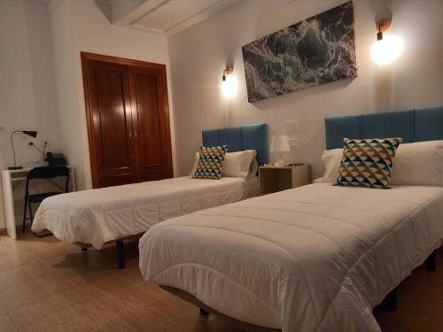 Katil atau katil-katil dalam bilik di HOTEL LOS CAÑAS