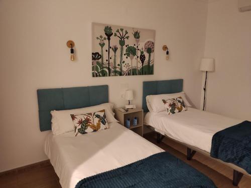Katil atau katil-katil dalam bilik di HOTEL LOS CAÑAS