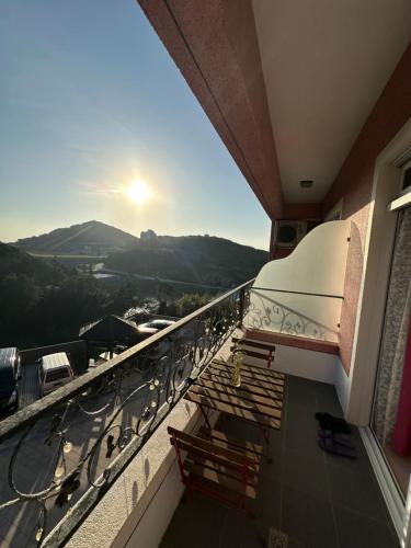 a balcony with a view of the mountains at Bei Ao Bi Shan Jyu in Dongyin