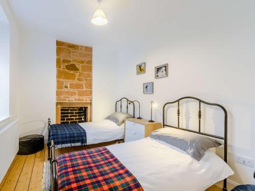 Ένα ή περισσότερα κρεβάτια σε δωμάτιο στο 3 Bed in Lockerbie 89406