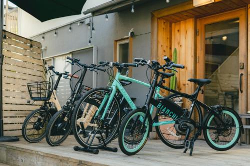 a group of bikes parked next to a building at guesthouse SHIBAFU in Kamakura